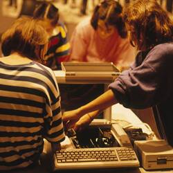 Digital Photograph - Students assembling Apple IIE Computer, Sunrise Classroom, Melbourne Museum, Russell Street, 1989