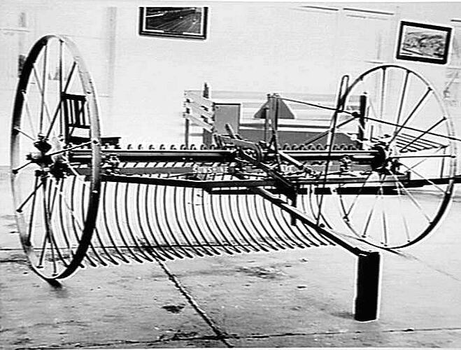 DUMP RAKE WITH TRACTOR HITCH. DEC 1954