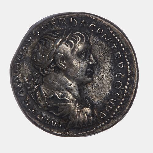 Round coin with male bust facing right. Text around.