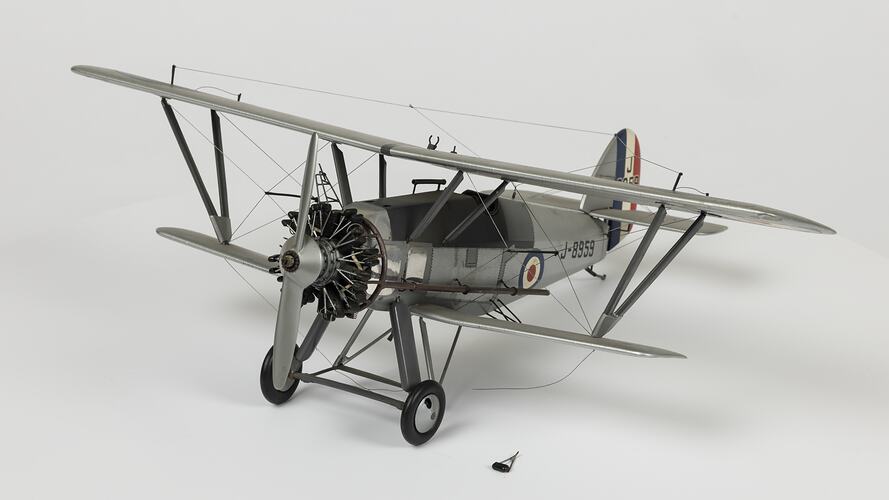 Model of silver aeroplane.