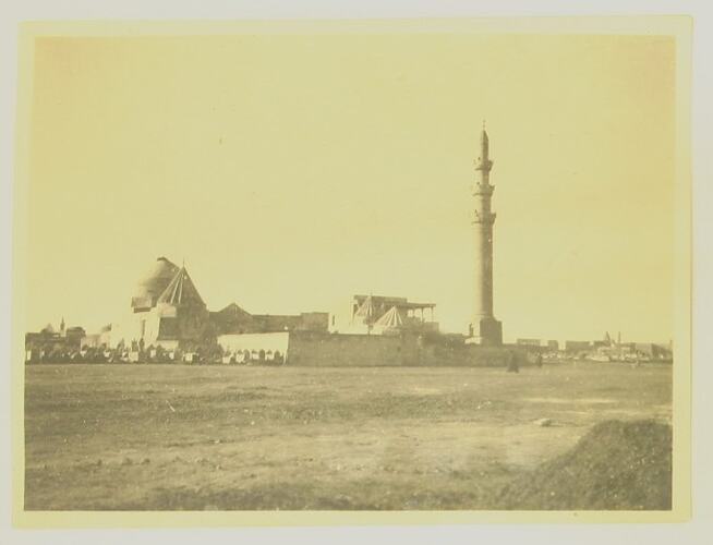 View of walls, domes and minaret, from outside Mosul.