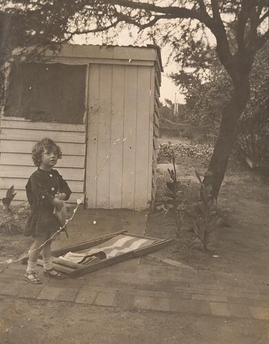 Digital Photograph - 'The Pearl', Girl in Backyard, Playing with Book & Deck-Chair, Deepdene, 1917