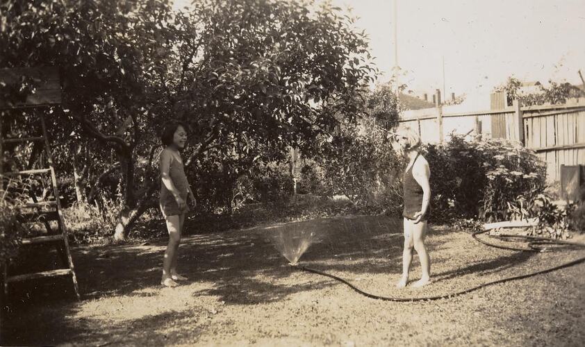 Digital Photograph - Two Girls Playing with Sprinkler, Back Garden, Northcote, 1949