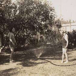 Digital Photograph - Two Girls Playing with Sprinkler, Back Garden, Northcote, 1949