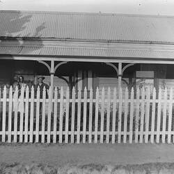Digital Photograph - Man, Woman & Baby Standing in front of Weatherboard House, Preston, circa 1902