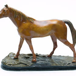 Painted statue of a horse.
