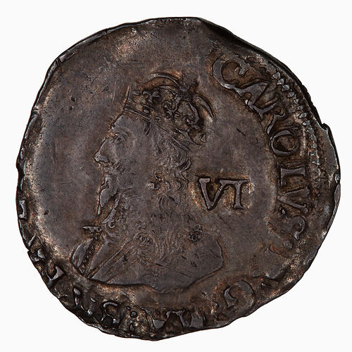 Coin, round, Crowned bust of the King facing left wearing a lace collar and armour; text around.