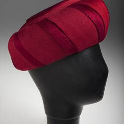 Beret-style scarlet hat, turban shape.