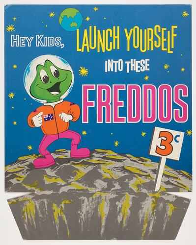 Freddo the Frog cartoon. Freddo frog on moon with planet earth above in sky. Colourful text.