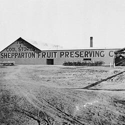 Building on farm with Shepparton Fruit Preserving painted on side wall.