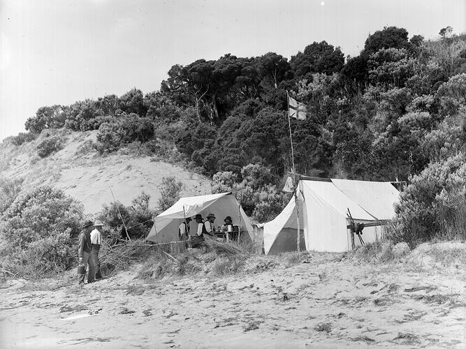 [Flying the Union Jack at the naturalists camp, Phillip Island, about 1902.]