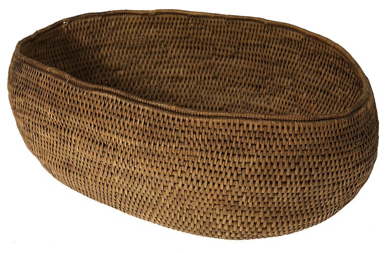 Side view of woven container.