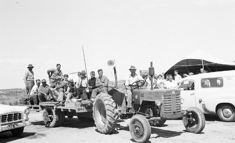 Monochrome photograph of a fishing competition.