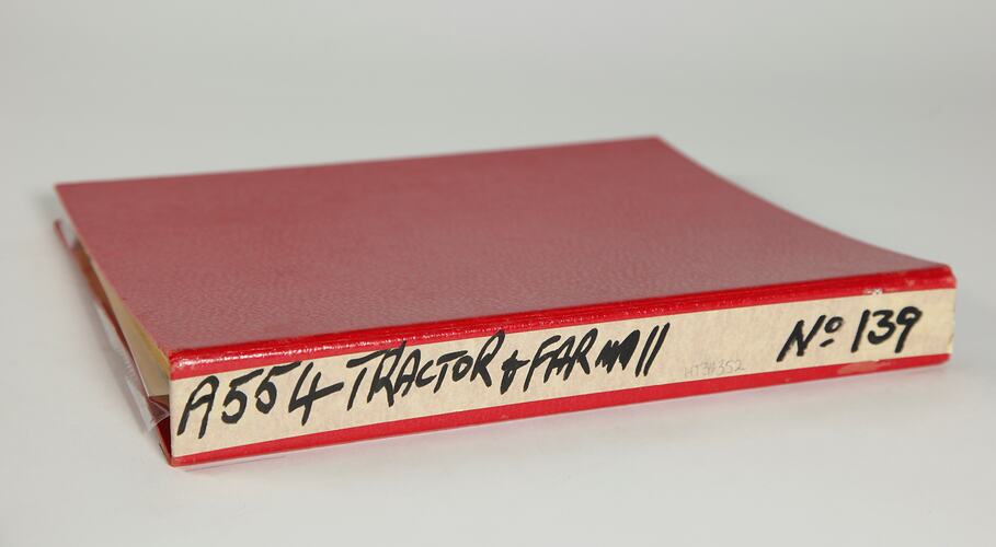 Photograph Album of harvesting equipment.