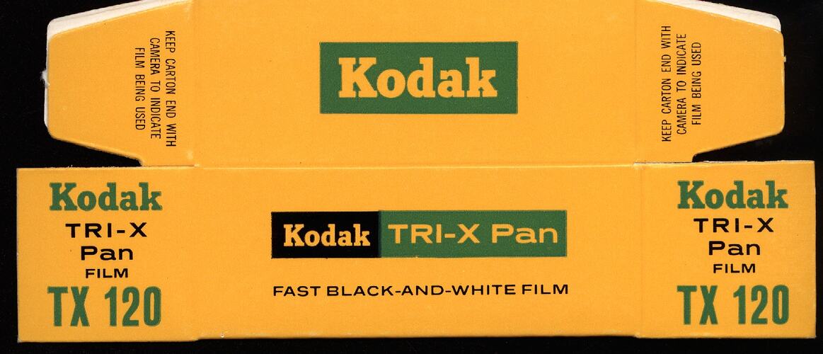Yellow flatpack box with green and black text.