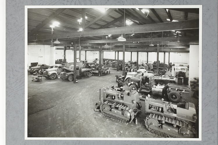 Monochrome photograph of a showroom interior.