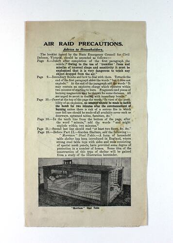 Pamphlet cover with photo of mesh box containing person