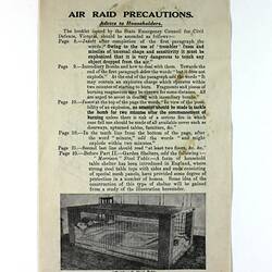 Pamphlet cover with photo of mesh box containing person