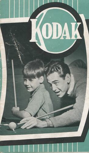 Cover page with photograph of man and child.