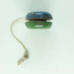Top view of blue/green wooden yo-yo with string.