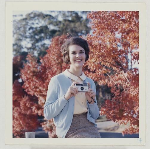 Woman Holding Kodak Camera, circa 1960s