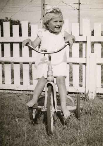 Susan Leech Riding Her Tricycle in Back Yard, Frankston, circa 1954