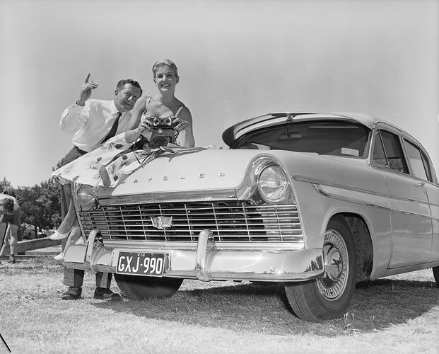 Cambridge Film & Television, Man & Woman with Chrysler Car, Albert Park, Victoria, Jan 1959