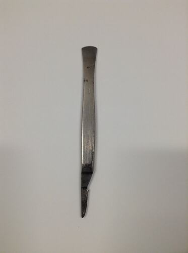Long metal tool, most likely used for engraving jewellery.