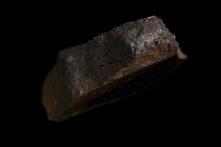 Blocky orange-brown rock.