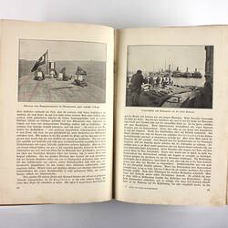 Inside pages of book showing photos of men on dock and ships.