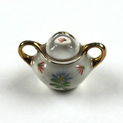 Tiny sugar bowl, side view.
