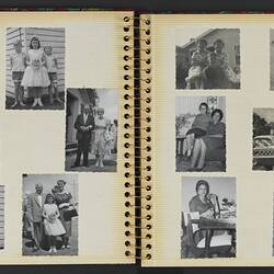 Open photo album with off white pages with twelve black and white photographs.