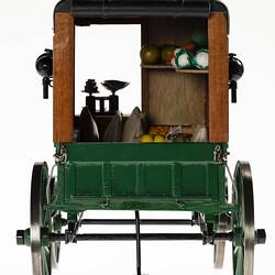 Fruiterer's four wheel van model. View from behind. Model food within is visible.