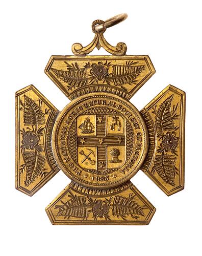 Bronze cross. Central medal has shield, stars, ship, golden fleece, tools, wheat.