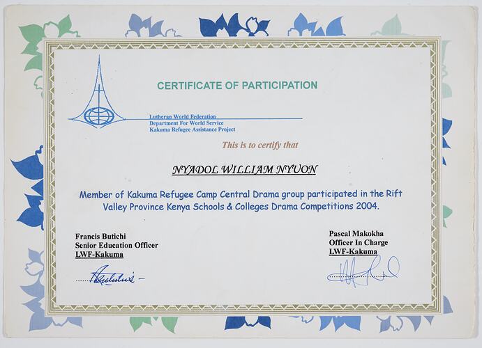 Rectangular white card certificate with blue, green black and gold printing.