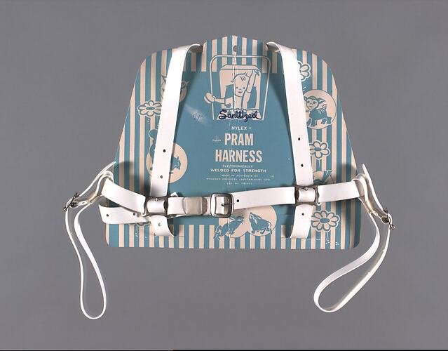 Front of pram harness with label.