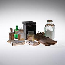 Pills and potions from a medicine chest.
