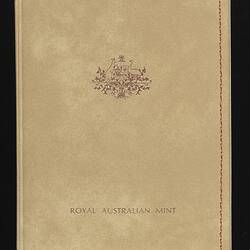 Closed cream coin folder.