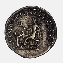 Round coin. Seated figure facing left holds olive branch. Figure kneels at their feet, arms raised. Text around.