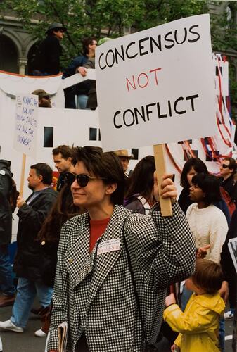 Digital Photograph - Woman Marching in Street Demonstration, Holding Placard, Melbourne, circa 1992