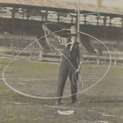 Digital Photograph - Holden Brothers Circus, Man in 'Cowboy' Hat Spinning a Lasso in Showground, Royal Melbourne Show Ground, Ascot Vale, circa 1910