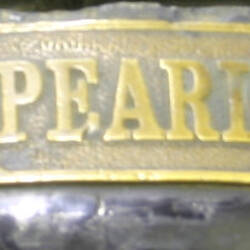 Detail of manufacturer's plate from a printing press.