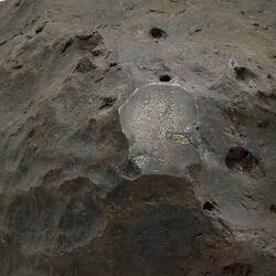 Close-up of meteorite specimen.