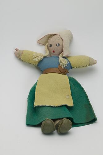 Pretty felt doll with  clogs.