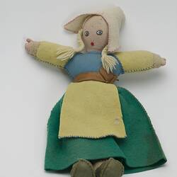 Pretty felt doll with  clogs.