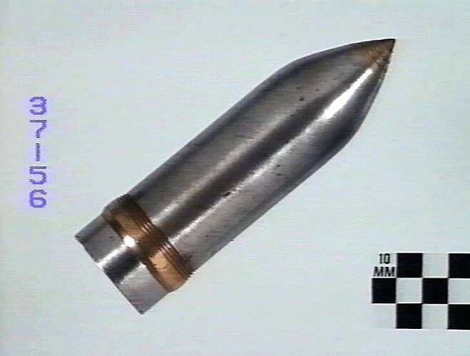 Side view of projectile shell.