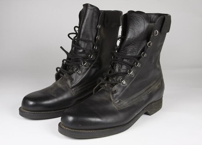 Pair of black leather lace-up boots.