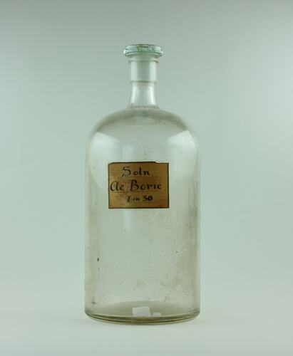 Apothecary jar with label for boric acid