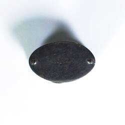 Metal compass, back view.