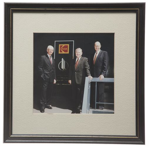Kodak Australasia Pty Ltd, Three Men with Inaugural Australian Quality Prize plaque, framed